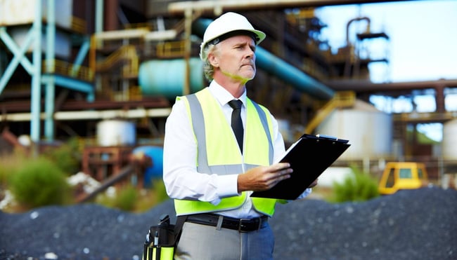 Environmental Consultant Conducting a Premium Phase I ESA male environmental consultant conducting phase i