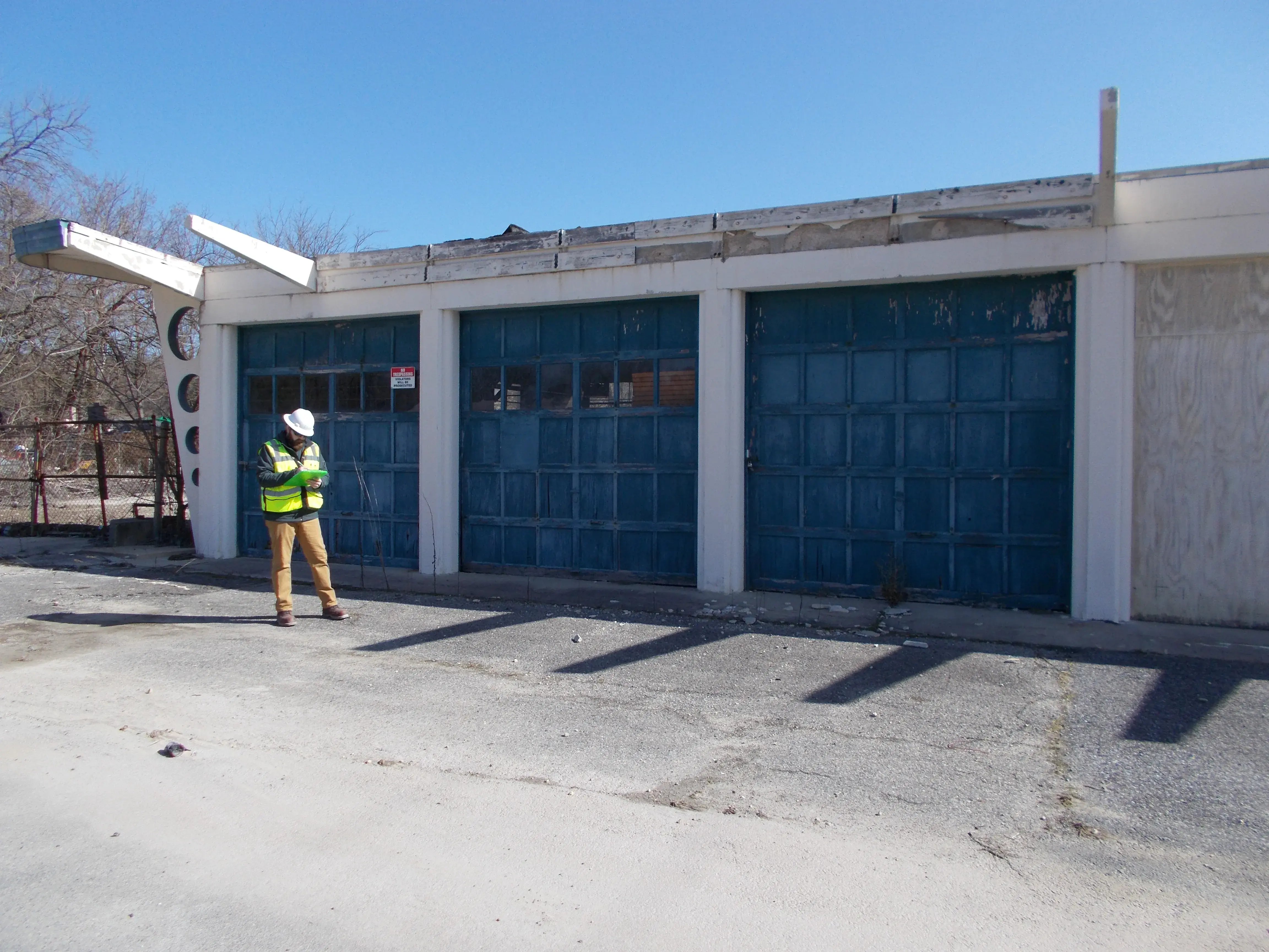 RMA consultant performing a Phase I ESA inspection at a former auto repair garage