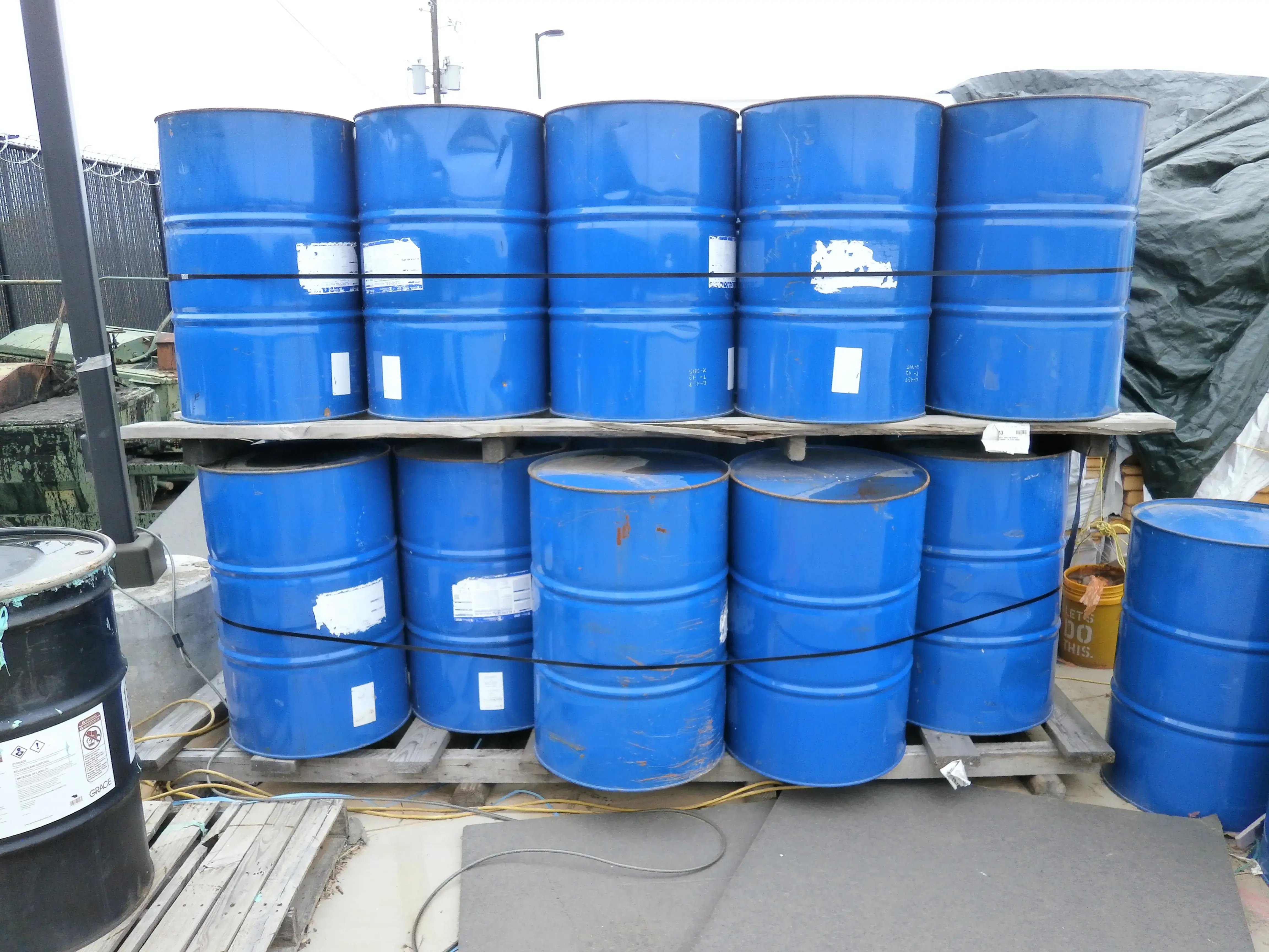 drums of oil at industrial site