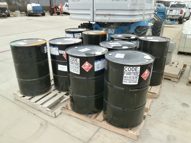 various chemicals in drums