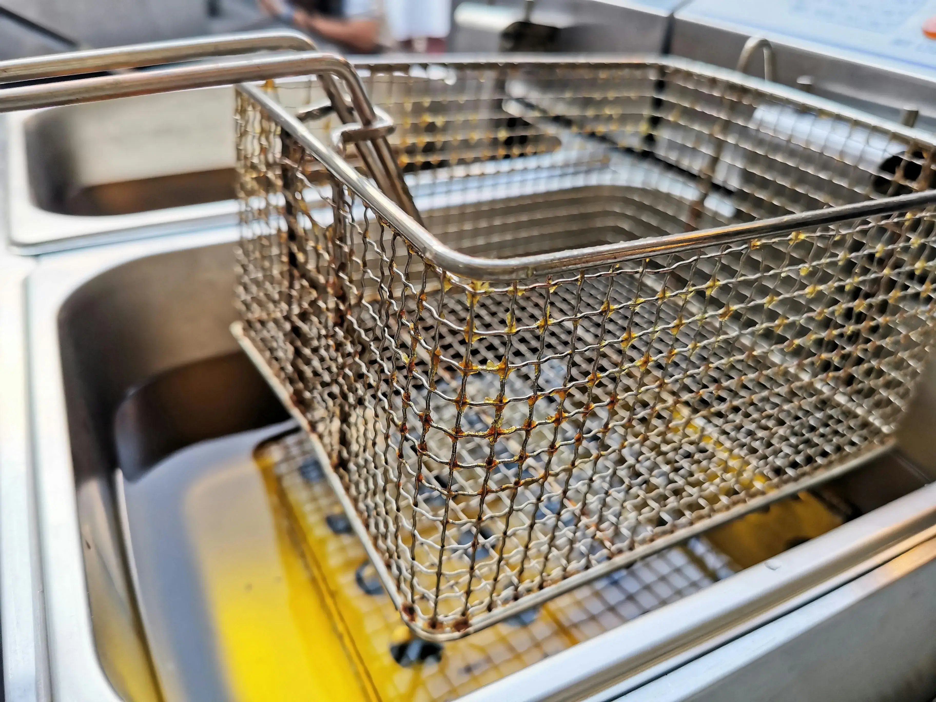 fryer of used oil at restaurant