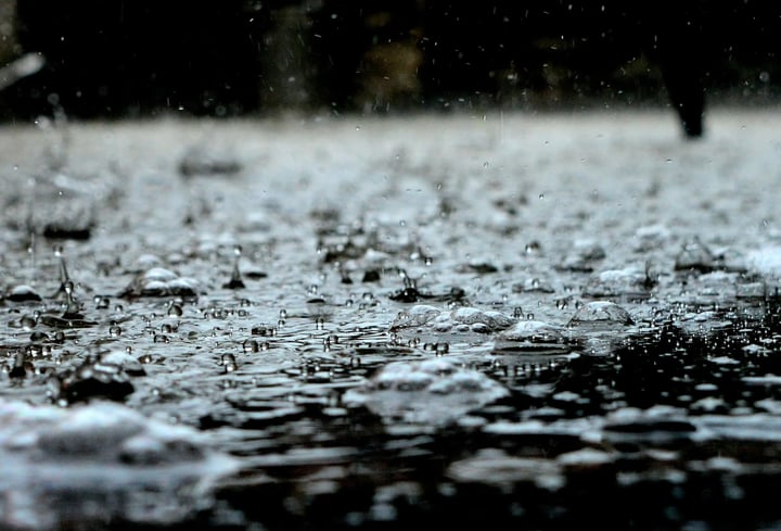 rain splashing into water