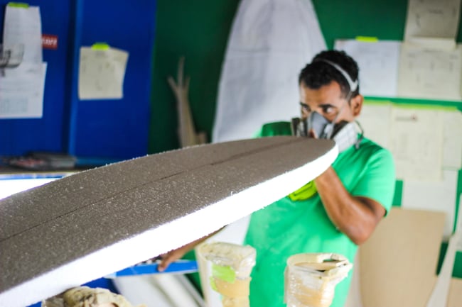 manufacturing a surfboard shaping surfboard