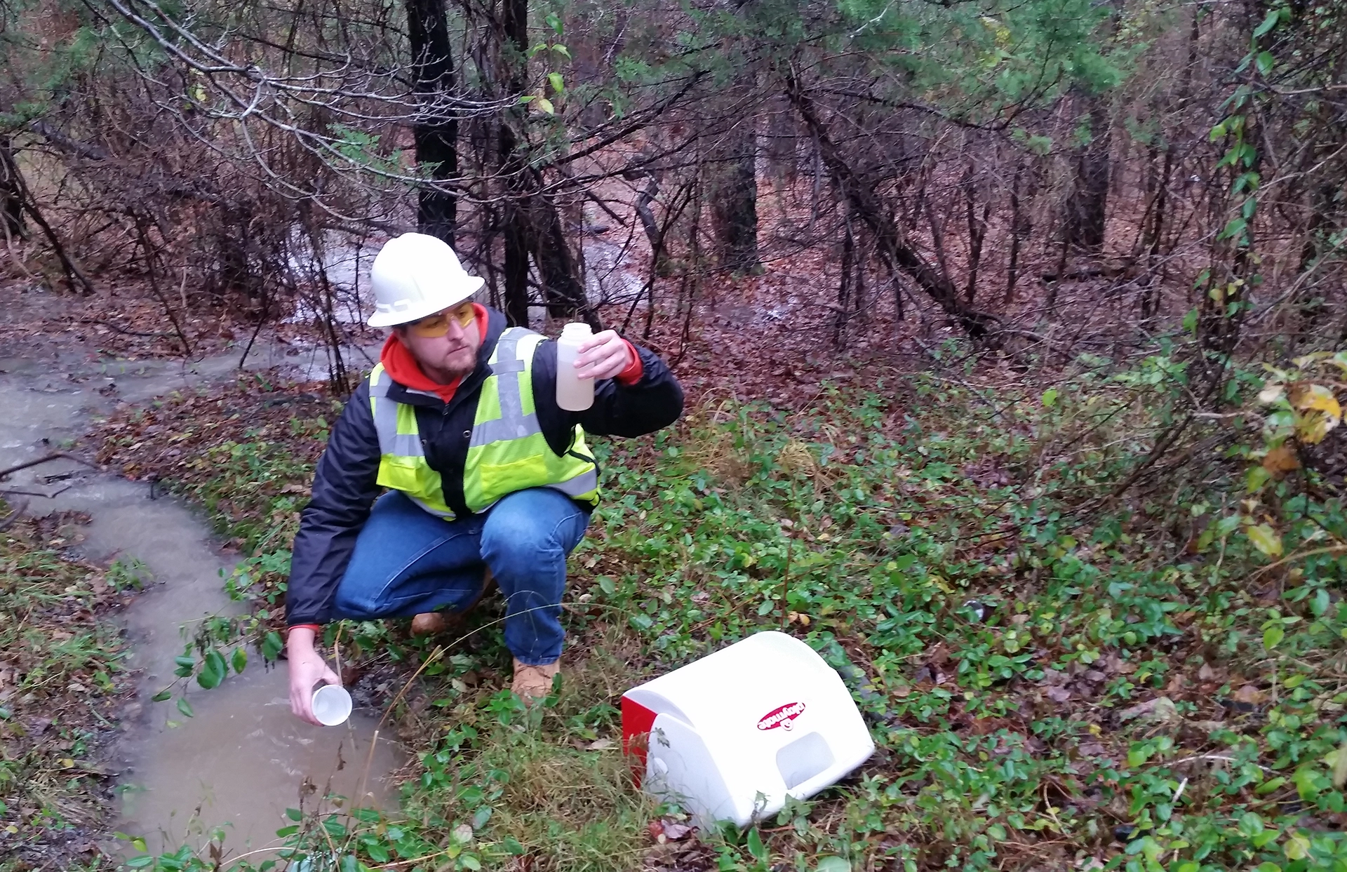 Man Testing Stormwater Sample