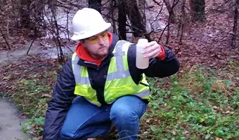 Man Working On New Jersey NJPDES Industrial Stormwater Permitting | Resource Management Associates | RMA Green